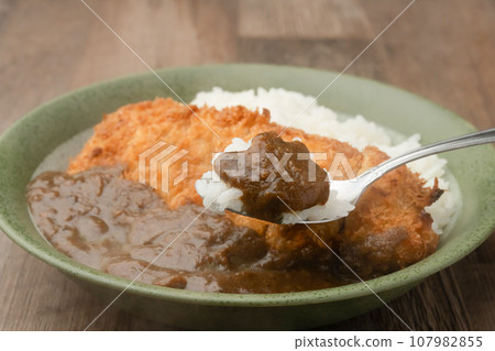 Cutlet curry with chopsticks 107982855