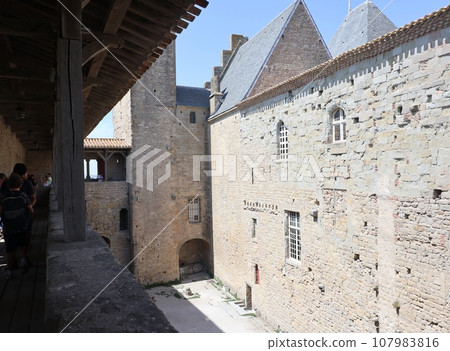 The courtyard of the Cité fortress in Carcassonne, France The courtyard of the Cité fortress in Carcassonne, France 107983816