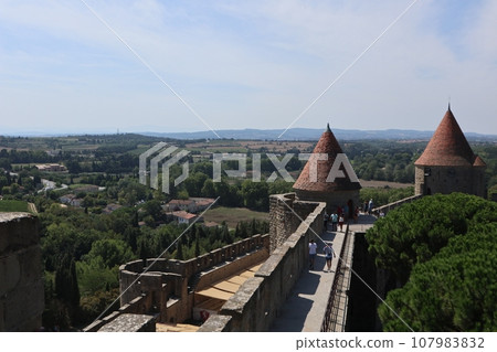 The walls of the historic fortified city of Carcassonne, France 107983832