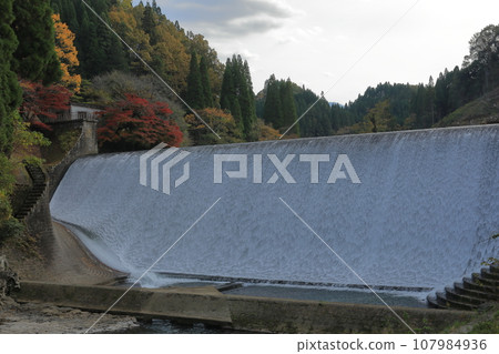 Takeda City Hakusui Dam cascading down with white lace ripples Takeda City Hakusui Dam cascading down with white lace ripples 107984936