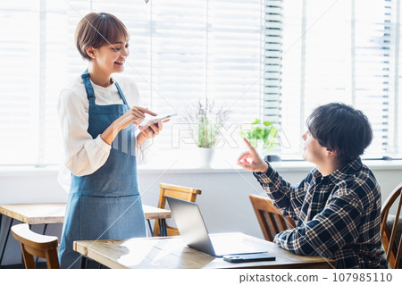 Cafe young clerk floor staff 107985110