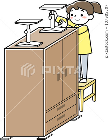 A woman attaching fall prevention equipment to furniture A woman attaching fall prevention equipment to furniture 107985507