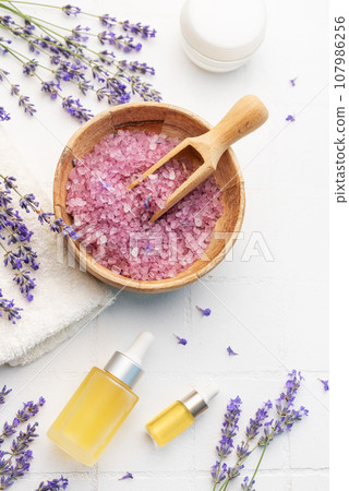 Lavender spa. Lavender salt, natural essential oil and fresh lavender 107986256