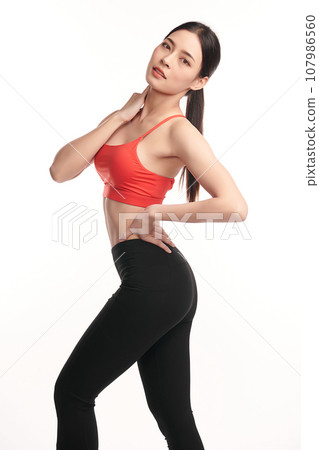 Beautiful young asian sport woman with sportswear ready for exercise on white background, Advertising sportswear and yoga wear, Healthy lifestyle, sport. Beautiful young asian sport woman with sportswear ready for exercise on white background, Advertising sportswear and yoga wear, Healthy lifestyle, sport. 107986560