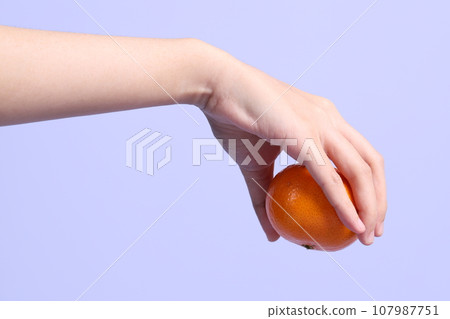 Hand with Fruit Hand with Fruit 107987751