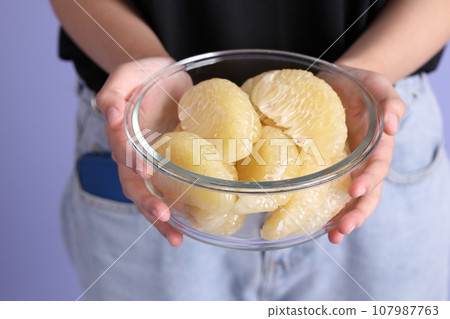 Hand with Fruit Hand with Fruit 107987763