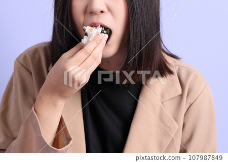 Hand Holding Food 107987849