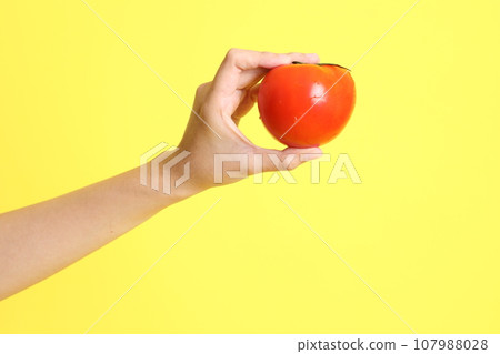Hand with Fruit 107988028