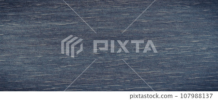 Wooden dark board as background texture. Place for text 107988137