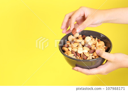 Hand with Snack Hand with Snack 107988171