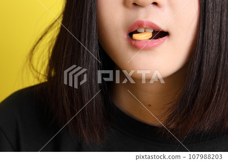 Hand with Snack Hand with Snack 107988203