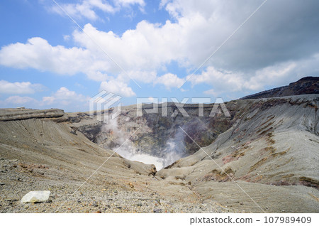 The crater of Mt. Aso that raises the eruption The crater of Mt. Aso that raises the eruption 107989409