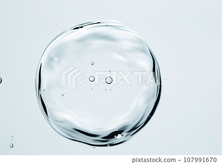 water droplets floating on white background 107991670
