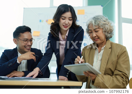 Asian entrepreneurs and business people meeting in a conference room in business planning, financial budget and investment risk assessment to analyze customer groups to increase company growth. 107992176