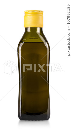 Olive oil bottle with yellow cap isolated on white background 107992189