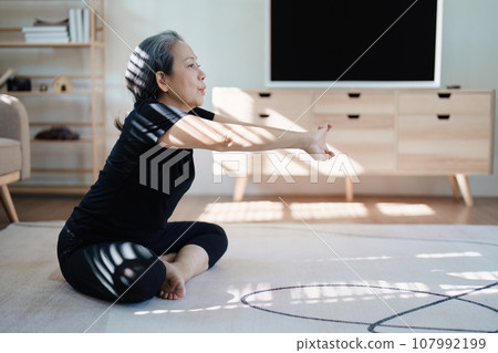 stress relief, muscle relaxation, breathing exercises, exercise, meditation, portrait of Young Asian woman relaxing her body from by practicing yoga 107992199