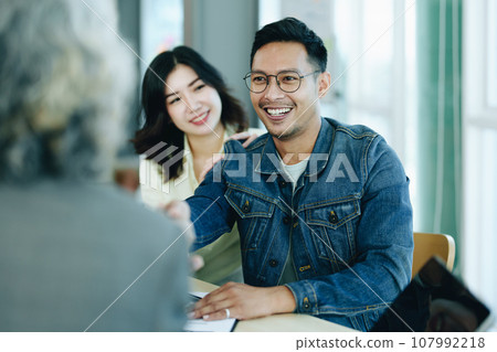 The bank's credit officer released the loan after a male business owner entered into an insurance contract using the mortgaged home property. The bank's credit officer released the loan after a male business owner entered into an insurance contract using the mortgaged home property. 107992218