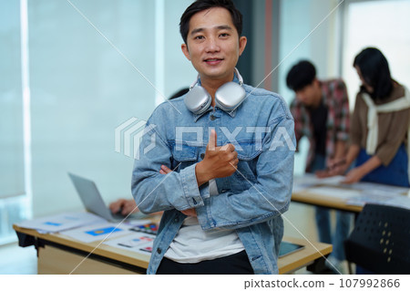 Group of asian creative team programing designers participate in all phases of the UX UI design Group of asian creative team programing designers participate in all phases of the UX UI design 107992866