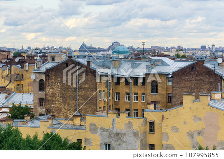 view of the roofs of the historical center of St. Petersburg on a cloudy day view of the roofs of the historical center of St. Petersburg on a cloudy day 107995855