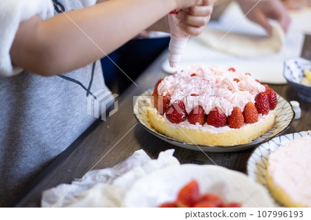 girl making cake at home girl making cake at home 107996193