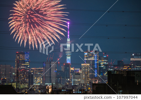 Kawasaki cityscape in Japan Tamagawa Fireworks Festival for the first time in 4 years. The venue side of the Kawasaki City Memorial Tamagawa Fireworks Festival. Roppongi Hills etc. in the back 107997044