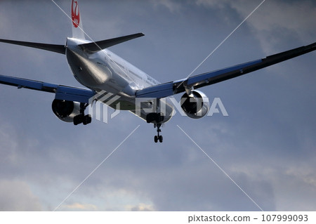 Passenger plane taking off and landing image 107999093