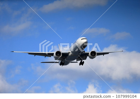 Passenger plane taking off and landing image 107999104