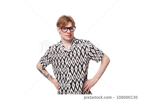 a young pleasant friendly caucasian ginger man with a tattoo on his arms is dressed in a black and 108000130