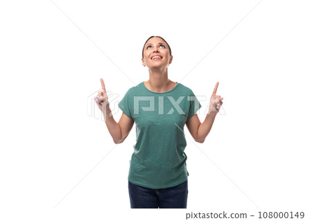 a young woman with black hair and a slender figure dressed in a green T-shirt attracts attention a young woman with black hair and a slender figure dressed in a green T-shirt attracts attention 108000149