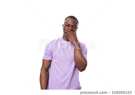 close-up portrait of a young pensive african man in a lilac t-shirt 108000183