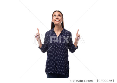 young successful brunette woman dressed in a blue shirt and jeans on a white background young successful brunette woman dressed in a blue shirt and jeans on a white background 108000261