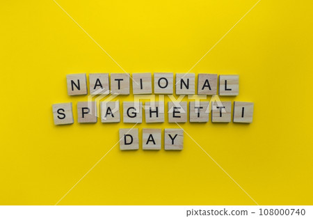 January 4, National Spaghetti Day, minimalistic banner with the inscription in wooden letters January 4, National Spaghetti Day, minimalistic banner with the inscription in wooden letters 108000740
