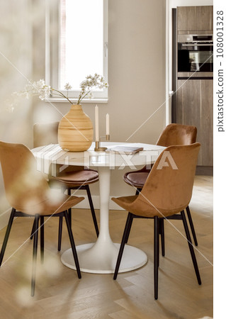 a dining room with chairs and a table in front of the window, there is a vase on the table a dining room with chairs and a table in front of the window, there is a vase on the table 108001328