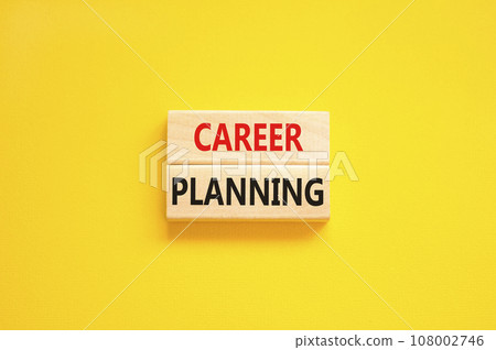 Career planning symbol. Concept words Career planning on beautiful wooden block. Beautiful yellow table yellow background. Business, motivational career planning concept. Copy space. 108002746