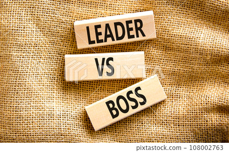 Boss vs leader symbol. Concept words Boss vs versus leader on wooden block. Beautiful canvas table canvas background. Business motivational boss vs leader concept. Copy space. Boss vs leader symbol. Concept words Boss vs versus leader on wooden block. Beautiful canvas table canvas background. Business motivational boss vs leader concept. Copy space. 108002763