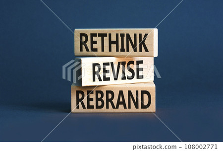 Rethink revise rebrand symbol. Concept word Rethink Revise Rebrand on beautiful block. Beautiful grey table grey background. Business brand motivational rethink revise rebrand concept. Copy space. Rethink revise rebrand symbol. Concept word Rethink Revise Rebrand on beautiful block. Beautiful grey table grey background. Business brand motivational rethink revise rebrand concept. Copy space. 108002771