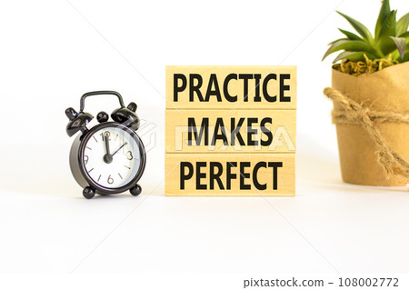 Practice makes perfect symbol. Concept words Practice makes perfect on wooden block. Beautiful white table white background. Black alarm clock. Business practice makes perfect concept. Copy space. Practice makes perfect symbol. Concept words Practice makes perfect on wooden block. Beautiful white table white background. Black alarm clock. Business practice makes perfect concept. Copy space. 108002772