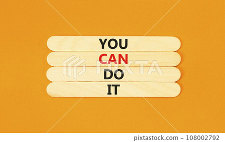 You can do it symbol. Concept word You can do it on beautiful wooden stick. Beautiful orange table orange background. Business motivational you can do it concept. Copy space. You can do it symbol. Concept word You can do it on beautiful wooden stick. Beautiful orange table orange background. Business motivational you can do it concept. Copy space. 108002792