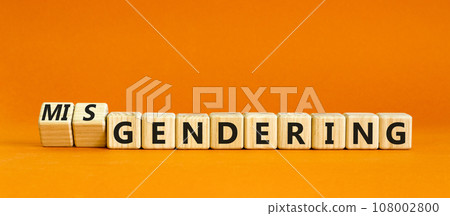 Gendering or misgendering symbol. Concept words Gendering Misgendering on wooden blocks. Beautiful orange table orange background. Gendering or misgendering concept. Copy space. Gendering or misgendering symbol. Concept words Gendering Misgendering on wooden blocks. Beautiful orange table orange background. Gendering or misgendering concept. Copy space. 108002800