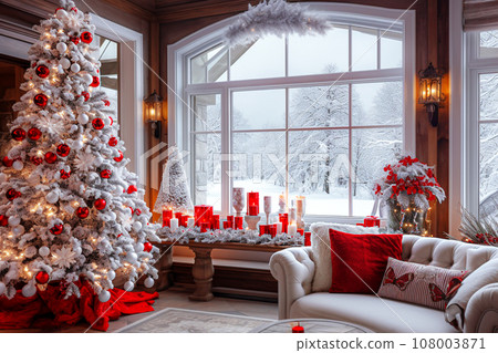 Interior of living room with Christmas tree, fireplace, sofa and candles. 108003871