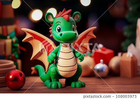 Christmas toy dragon on a wooden background. New Year and Christmas. 108003973