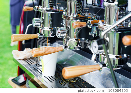 Professional Coffee Machine Installed in the Back of a Car: Coffee Service for Outdoor Events Professional Coffee Machine Installed in the Back of a Car: Coffee Service for Outdoor Events 108004503