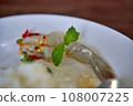 The Close-up photo of shrimp soaked in fish sauce, spicy sauce 108007225
