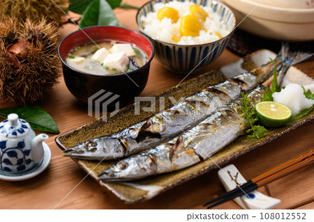 Japanese food Autumn table Sanma grilled with salt and chestnut rice cooked in a clay pot Miso soup Pacific saury Grilled fish Swordfish Japanese food 108012552