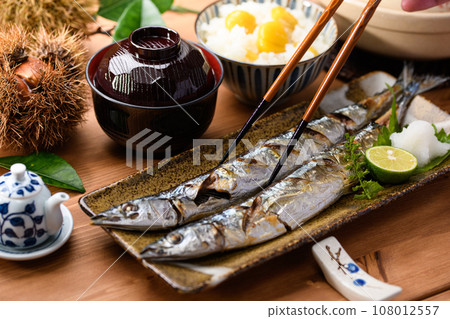 Japanese food Autumn table Sanma grilled with salt and chestnut rice cooked in a clay pot Miso soup Pacific saury Grilled fish Swordfish Japanese food 108012557