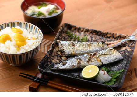 Japanese food Autumn table Sanma grilled with salt and chestnut rice cooked in a clay pot Miso soup Pacific saury Grilled fish Swordfish Japanese food 108012574