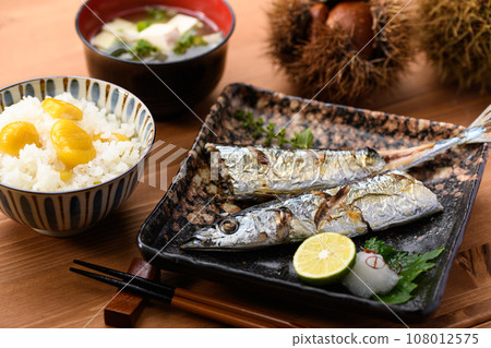 Japanese food Autumn table Sanma grilled with salt and chestnut rice cooked in a clay pot Miso soup Pacific saury Grilled fish Swordfish Japanese food 108012575