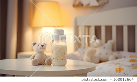 baby food, milk or formula for the baby against the background of a cozy baby room. High quality photo 108012664