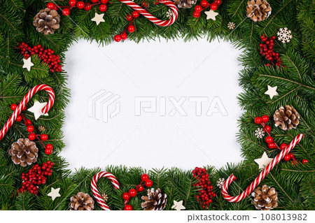 Christmas frame of tree branches Christmas frame of tree branches 108013982