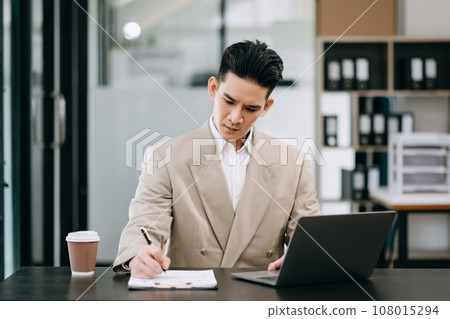 Mature business man executive manager looking at laptop watching online webinar training or having virtual meeting video conference doing market research working in office.. 108015294